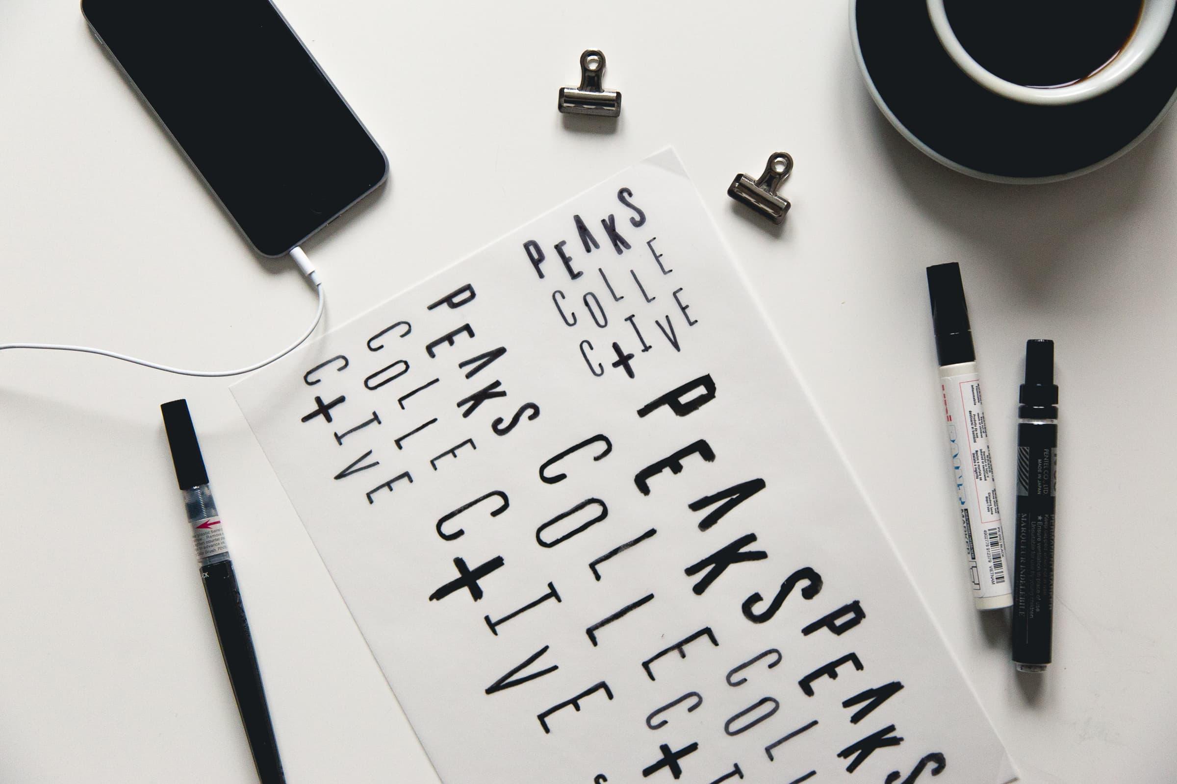 Peaks Collective lettering