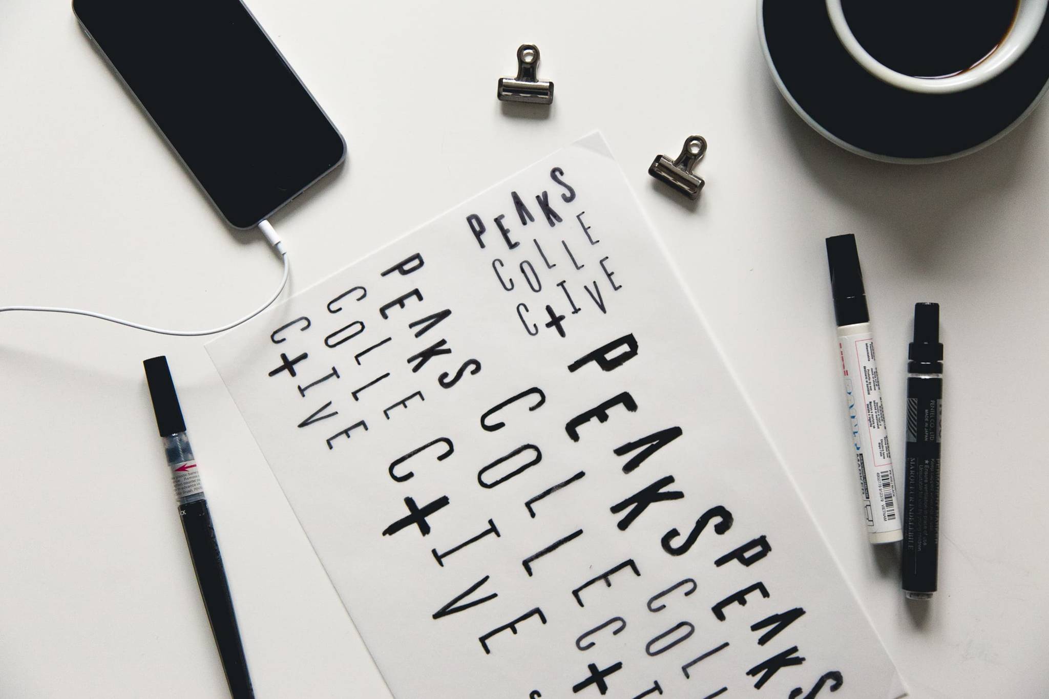 Peaks Collective lettering